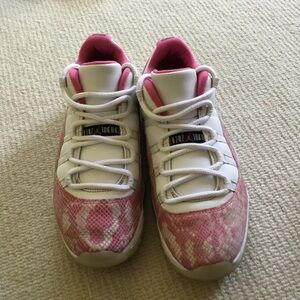 Jordan 1 Retro White and Pink Low-Top Sneakers